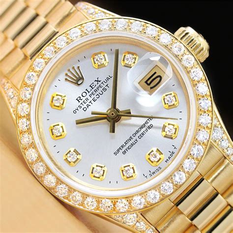 ladies gold rolex diamond bezel.